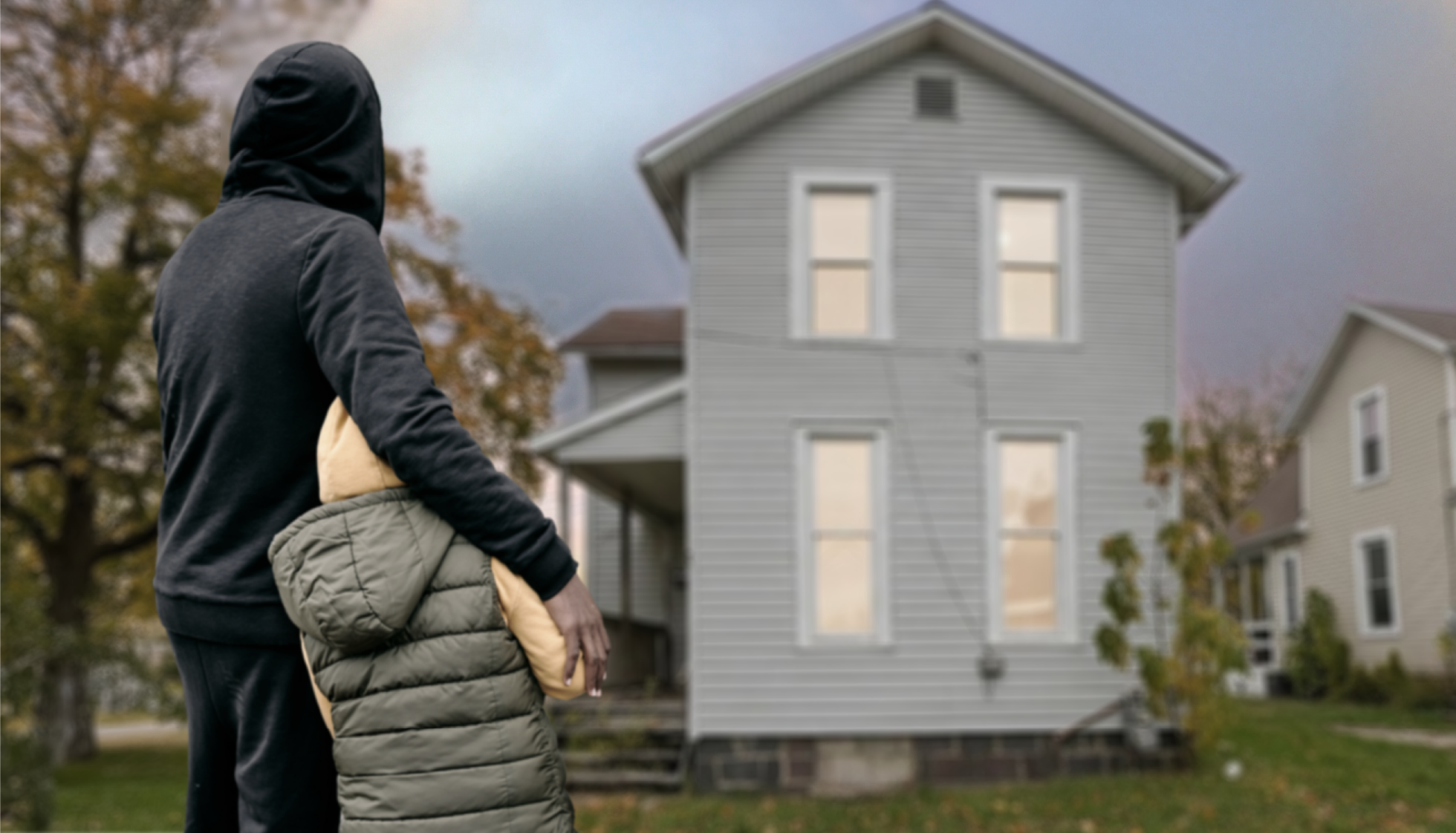 Father and son looking at home